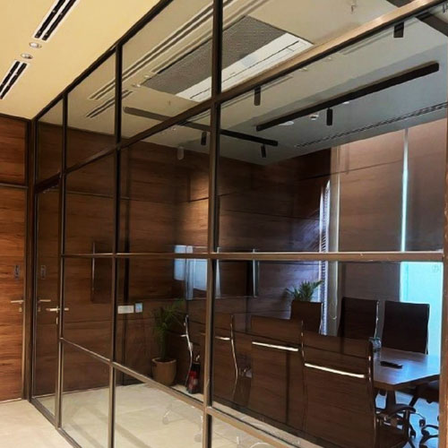 Slim profile glass partition with aluminium frame in office interior