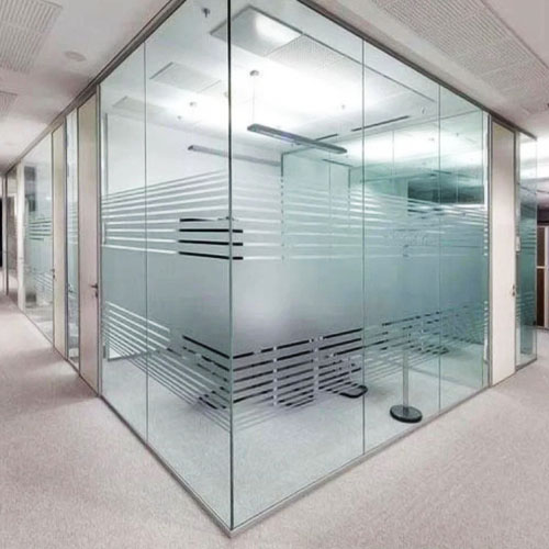 Modern toughened glass office partition in corporate workspace