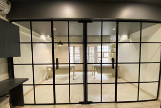 Modern interior design with slim aluminium and glass partition panels